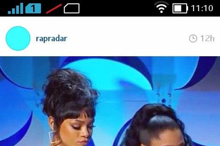 Rihanna peeps through Nicki Minaj's exposed cleavage