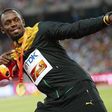 Usain Bolt of Jamaica, gold medal, reacts as he poses on the podium after the men's 200 metres event during the 15th IAAF World Championships at the National Stadium in Beijing, China, August 28, 2015.  REUTERS/Damir Sagolj