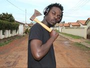 Kwaw Kese with an axe