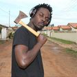 Kwaw Kese with an axe