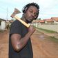 Kwaw Kese with an axe