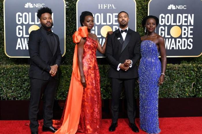 "Black Panther" actors (R-L) Lupita Nyong'o, Michael B. Jordan and Danai Gurira, with director Ryan Coogler at the Golden Globes -- the film is nominated for best drama film