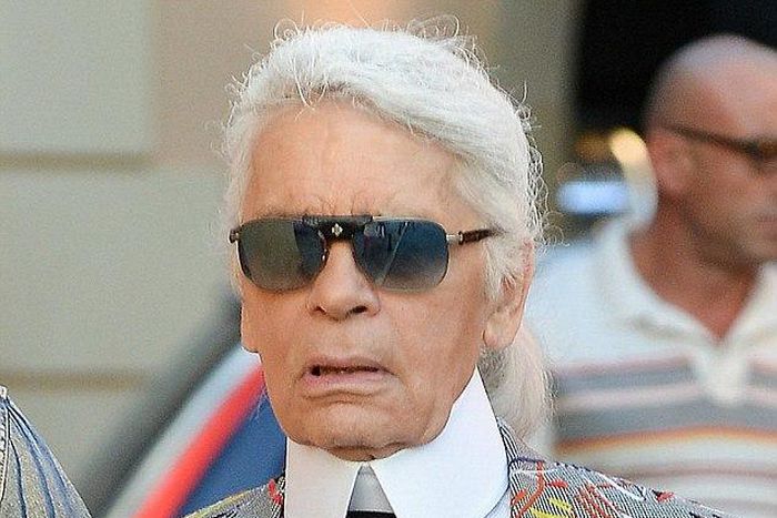 Karl Lagerfeld pictured wearing an unusual vibrant jacket