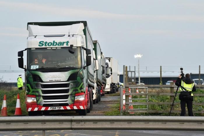 Lorries leave Manston airport in south east England for a trial to tackle post-Brexit traffic queues which Dover port has warned could lead to chaos