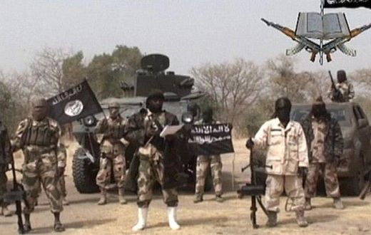 The sect leader Abubakar Shekau, flanked by his subordinates.
