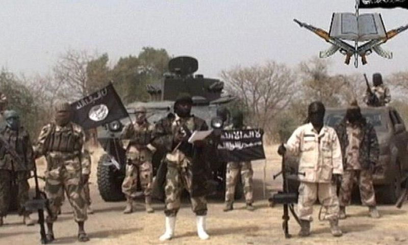 The sect leader Abubakar Shekau, flanked by his subordinates.
