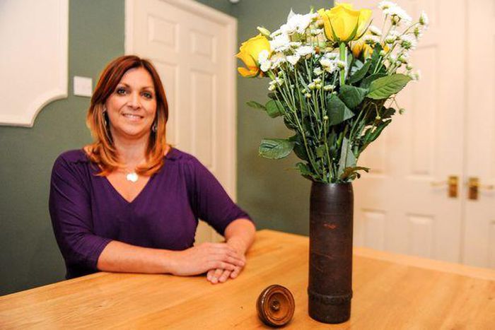 Mum uses unexploded bomb as a VASE for 30 years