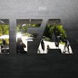 The logo of FIFA is seen in front of its headquarters in Zurich, Switzerland July 20, 2015. REUTERS/Arnd Wiegmann