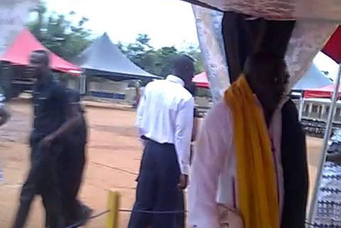 King George Arthur laid to rest while standing & holding football