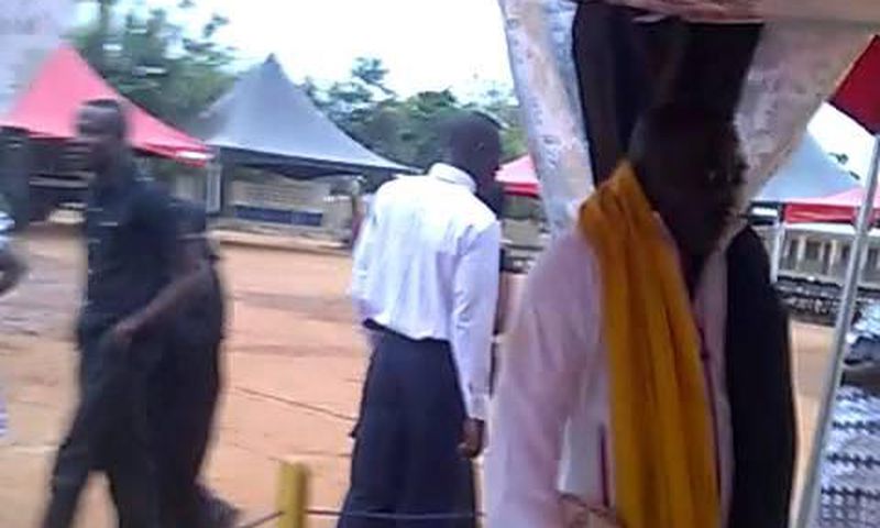 King George Arthur laid to rest while standing & holding football