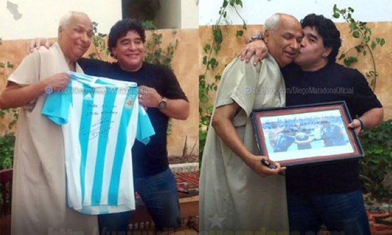 Hugged by the hands of God, infamous ref meets Maradona
