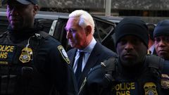 Longtime Donald Trump adviser Roger Stone arrives for his arraignment on charges of lying to Congress