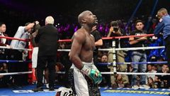 Floyd Mayweather kneels after the final round against Andre Berto (not pictured) in their WBA/WBC welterweight title bout at MGM Grand Garden Arena. Mayweather won via unanimous decision September 13, 2015.