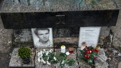 Flowers and candles stand at the grave in Prague of Jan Palach, who burnt himself to death 50 years ago to protest at the Soviet-led occupation of then Czechoslovakia