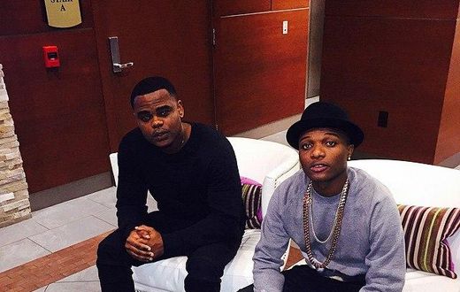 Wizkid with a friend in Houston spotting his Balenciaga race runner footwear which costs $695 a piece