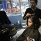 Manassif Raza opened his own hair salon in Athens after escaping poverty in Pakistan and spending two years in Greece doing whatever work he could get
