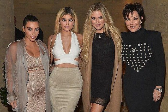 A blonde Kylie Jenner along with her sisters, Kim and Khloe Kardashian and their mother, Kris Jenner at their app launch