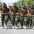 Iraqi members of the powerful Iran-backed Badr Brigades take part in a parade marking al-Quds (Jerusalem) Day in the capital Baghdad, on July 1, 2016