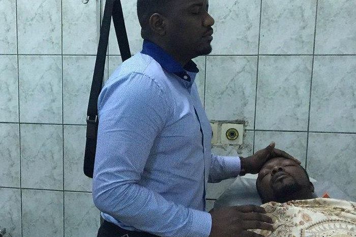 John Dumelo prays for KOD