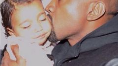 Kanye West kisses daughter North West