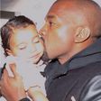 Kanye West kisses daughter North West