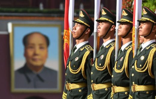 Chinese soldiers outside the Great Hall of the People in Beijing on June 7, 2018