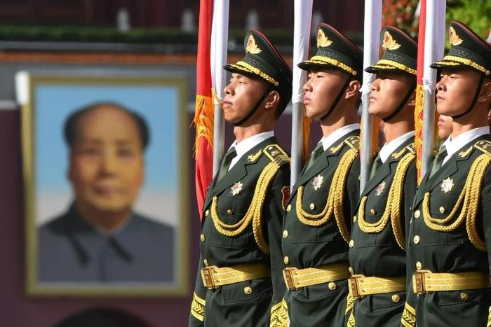 Chinese soldiers outside the Great Hall of the People in Beijing on June 7, 2018