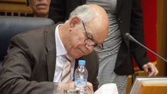 Mohammed Chouaib, head of a delegation from the UN-recognised government, signs a tentative deal