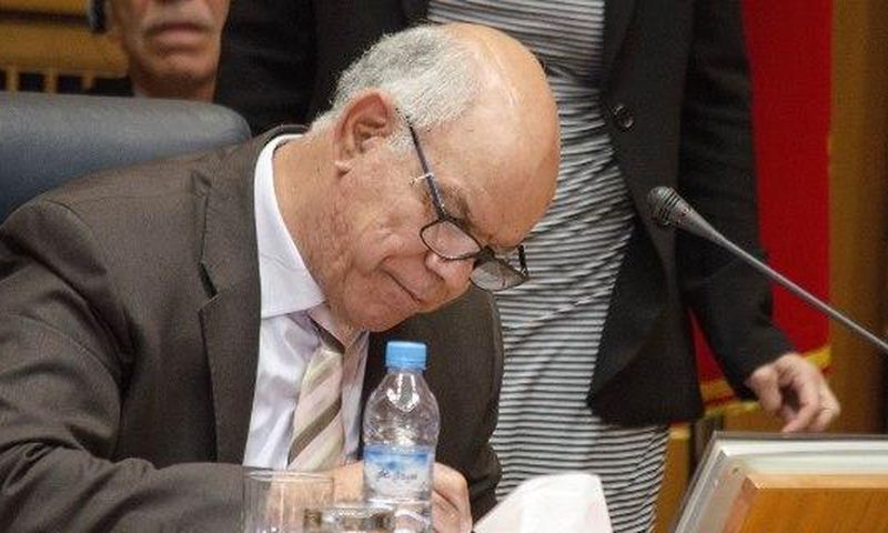 Mohammed Chouaib, head of a delegation from the UN-recognised government, signs a tentative deal