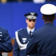 Brazilian President Jair Bolsonaro, seen here receiving military honors at an air base in Brasilia, has deployed the military to fight crime in the northern state of Ceara, scene of attacks by rampaging gangs