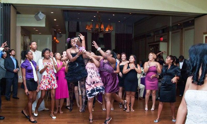 Airborne ladies trying to catch the bouquet