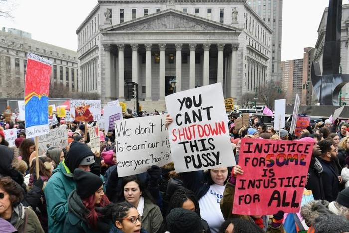 Hundreds of protesters gathered for the Women's Unity Rally at Foley Square in New York City, while a breakaway group rallied elsewhere in the city