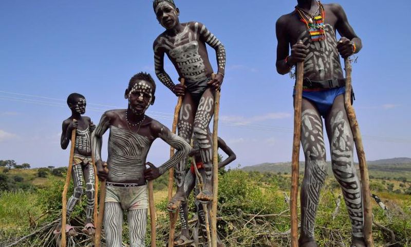 Traditionally mixed from clay, chalk, ash and cattle dung, the white or grey body paint is widely thought to help individuals moderate body heat amid soaring bush and savanna temperatures