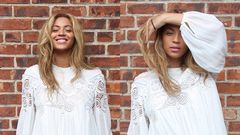 Pop singer, Beyonce rocking a flared white dress