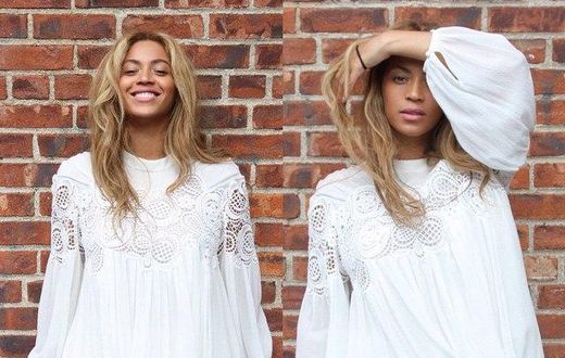 Pop singer, Beyonce rocking a flared white dress