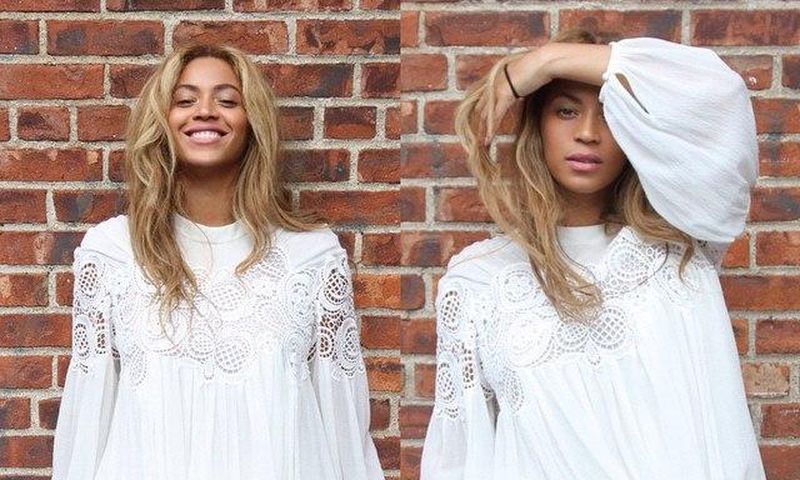 Pop singer, Beyonce rocking a flared white dress