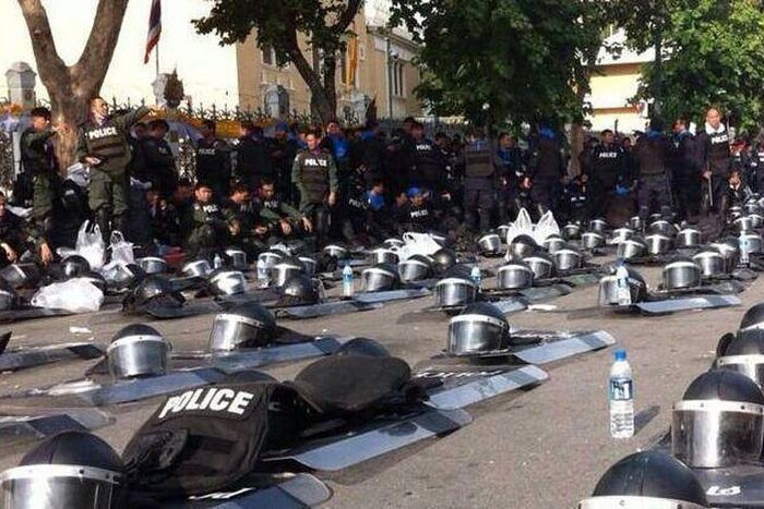 This riot police team in Thailand who laid down their shield as a sign of solidarity for the protesters they were ordered to block.
