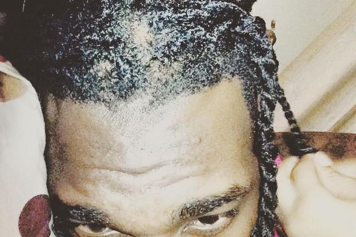 Burna Boy unveils new hairstyle