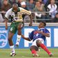 Marcel Desailly of France tackles Philemon Masinga (L) of South Africa during a 1998 World Cup group match in Marseille