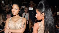 Rapper, Nicki Minaj, rocks mesh nude dress, flaunting curves