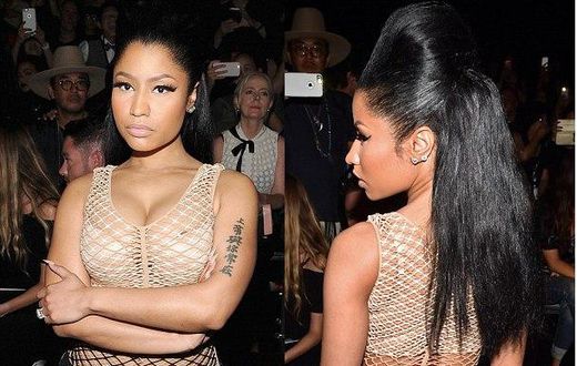Rapper, Nicki Minaj, rocks mesh nude dress, flaunting curves