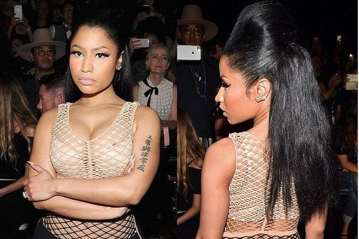 Rapper, Nicki Minaj, rocks mesh nude dress, flaunting curves