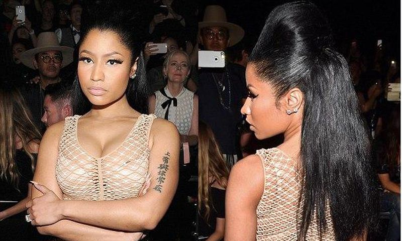 Rapper, Nicki Minaj, rocks mesh nude dress, flaunting curves