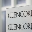 The logo of Glencore is pictured in front of the company's headquarters in the Swiss town of Baar, November 13, 2012. REUTERS/Michael Buholzer