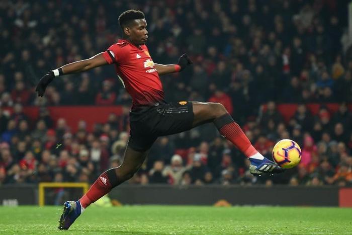 Paul Pogba scored in Manchester United's late comeback to snatch a 2-2 draw at home to Burnley on Tuesday