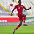 Qatar's Almoez Ali celebrates one of his four goals aagainst North Korea at a near-empty stadium