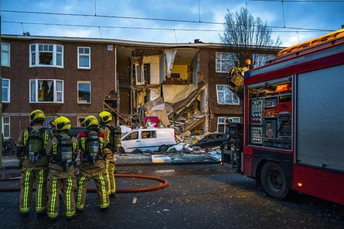 Firefighters rescued three people from the rubble of the house and were working to free a fourth