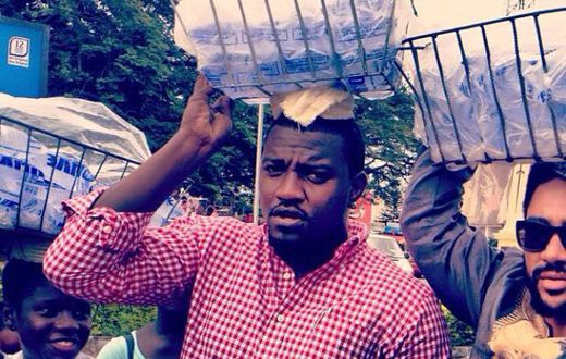 John Dumelo & Majid Michel selling pure water