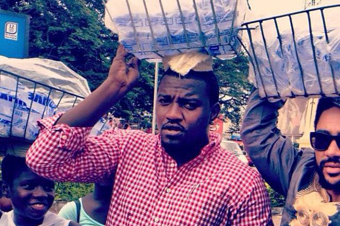 John Dumelo & Majid Michel selling pure water