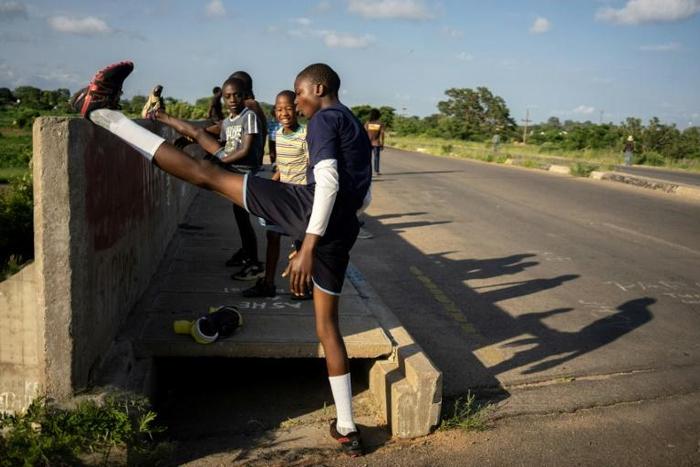 The wide stretch of road is a well-known gathering spot each morning from 5 to 7 am for fitness enthusiasts who stretch, jog, shadow-box, plank and do squats, push-ups, sit-ups and jumps